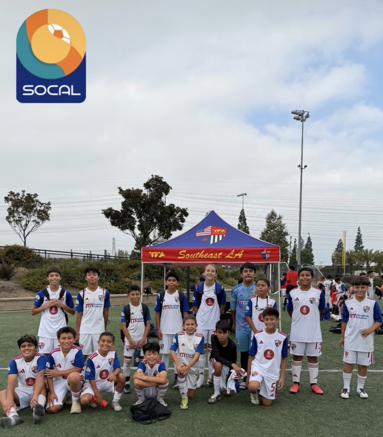 TFA-SELA BU13 White players together on the field